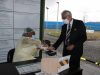 Minister of Health Sanitizes his Hands at the SGEHC
